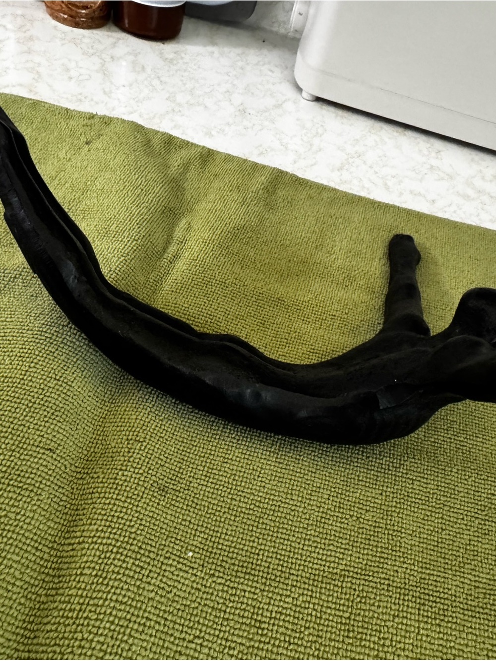 Diving Man cast iron wall hook.
